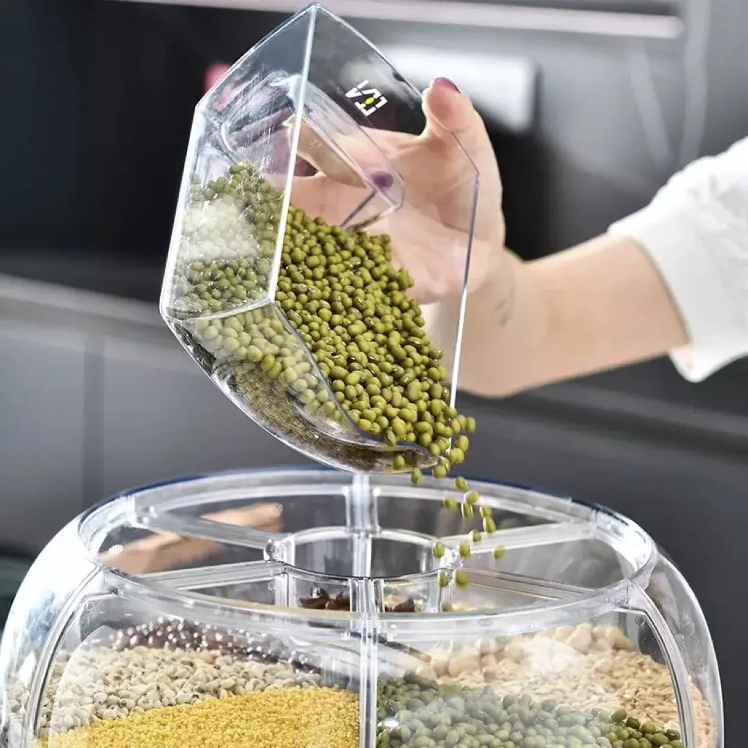 De 360 graden roterende rijst dispenser in de kleur wit. De dispenser heeft zes vakken voor voedsel en is ongedierte bestendig. 