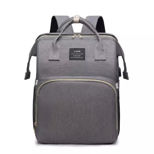 De voorkant van de grijze all-in-one luiertas met bedje van Bevano Favorites is te zien in het grijs.