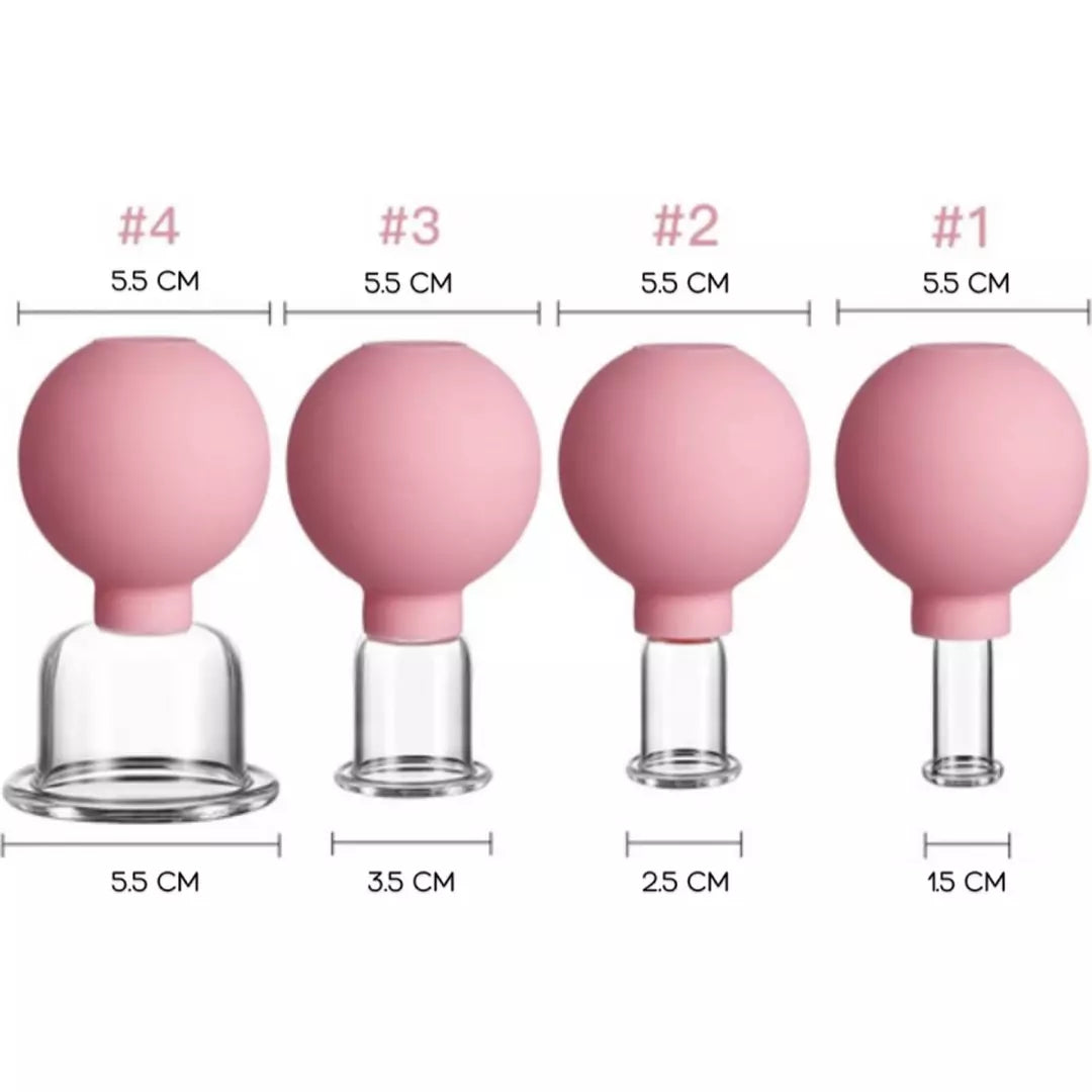 De Facial Cupping Set in de kleur roze. Facial cupping stimuleert de gezondheid van je huid en vermindert fijne lijntjes en rimpels. De verschillende afmetingen van de facial cupping set staan naast elkaar weergegeven.