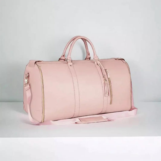 De luxe reistas met apart kledingvak in de kleur roze. De reistas is geschikt voor zowel handbagage als ruimbagage en is beschikbaar in verschillende kleuren. Nooit meer gekreukelde kleding. 