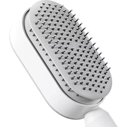 De witte ZenTangle zelfreinigende haarborstel is ingezoomd en in lagen zichtbaar. Je ziet hoe de techniek werkt achter de borstel. Je haarborstel schoonmaken kost vanaf nu geen enkele moeite meer.